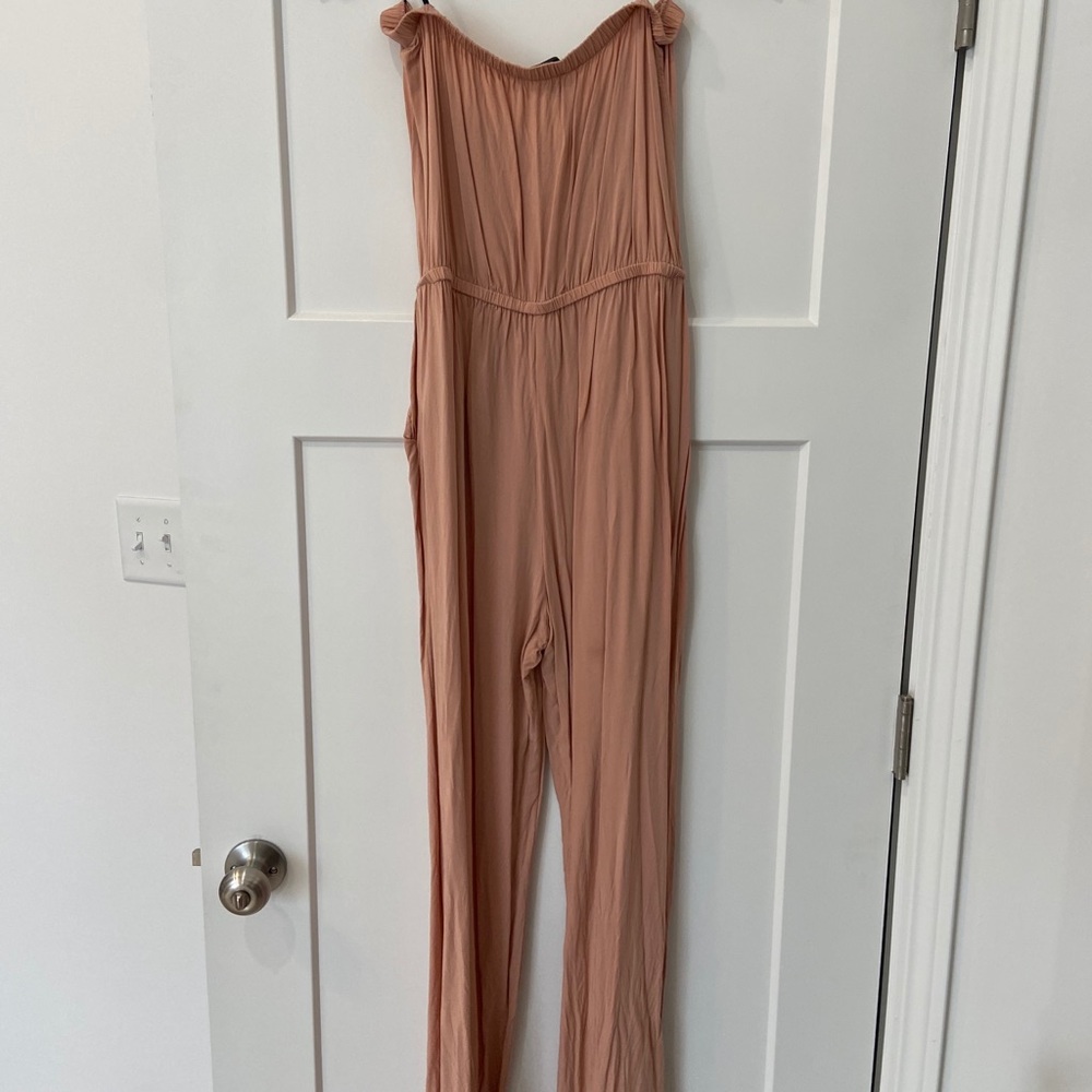 Nude jumpsuit, strapless, size M.